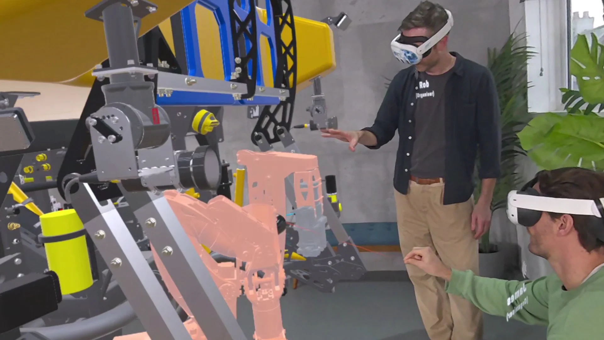 Two people in VR headsets conduct a training process on the operation of a Remote Operated Vehicle (ROV) using the JoinXR meeting software.